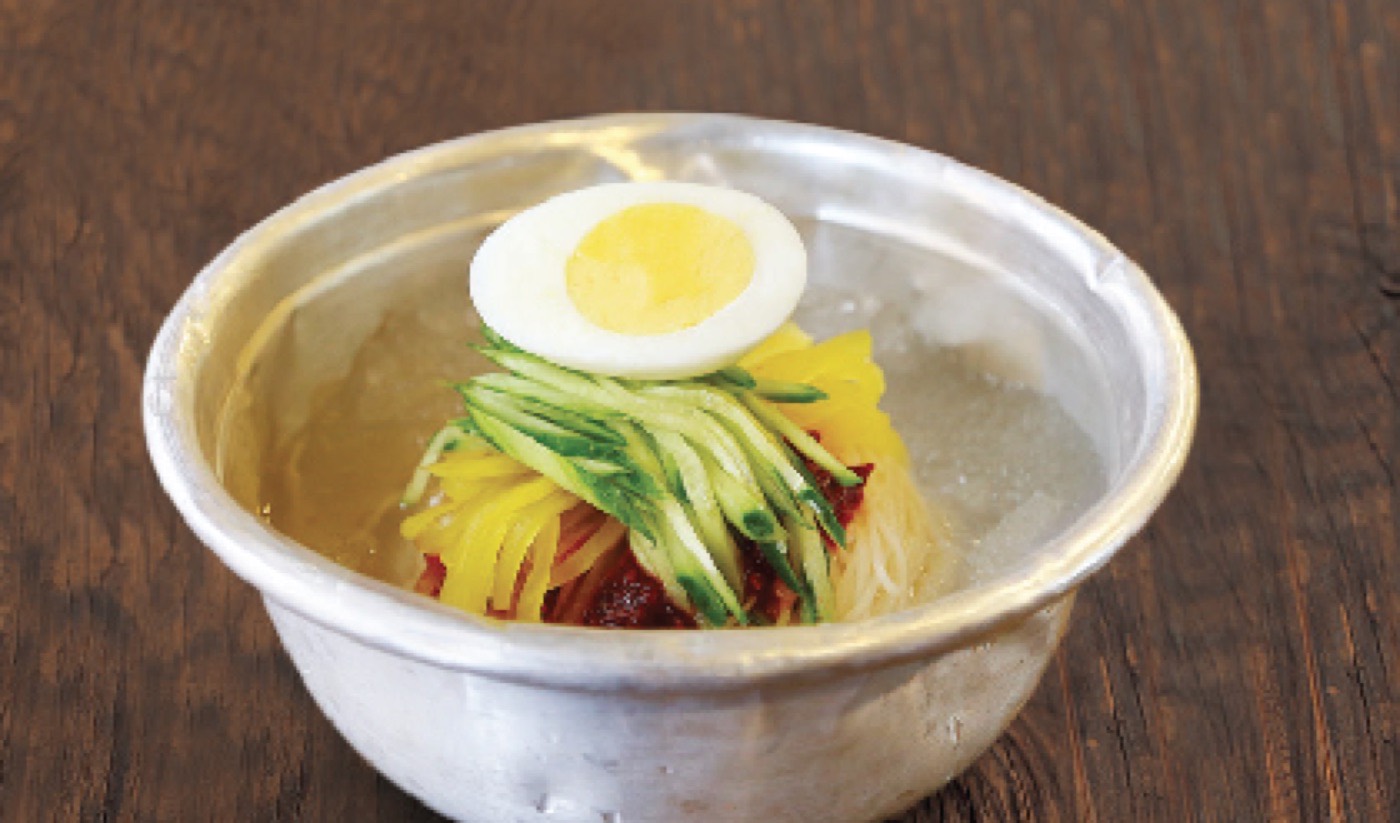 Chilled water cold noodle with egg and pickled radish